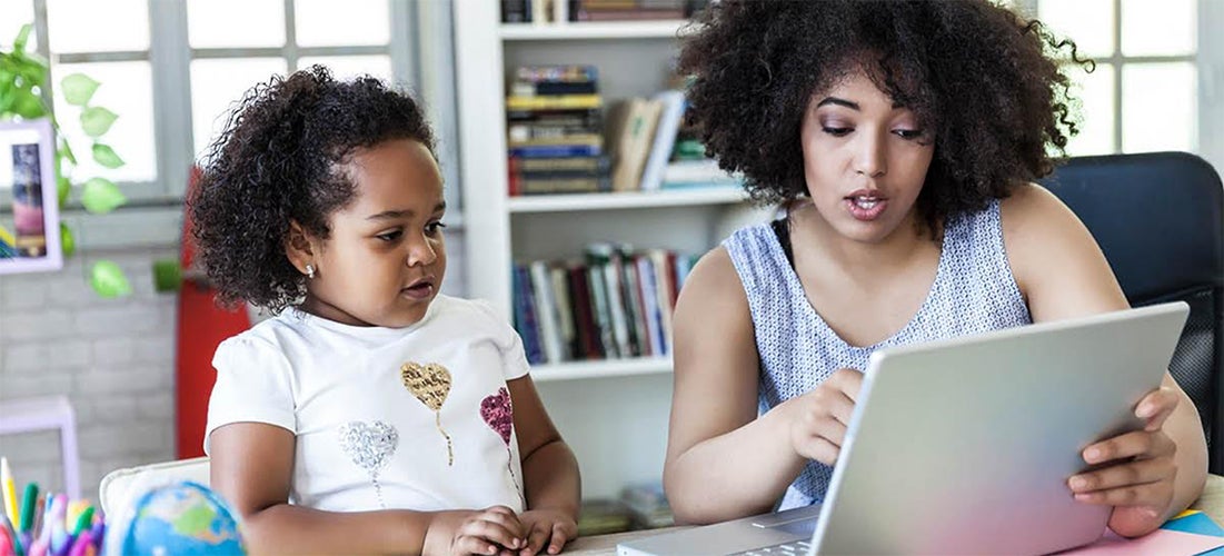 mother and daughter on laptop